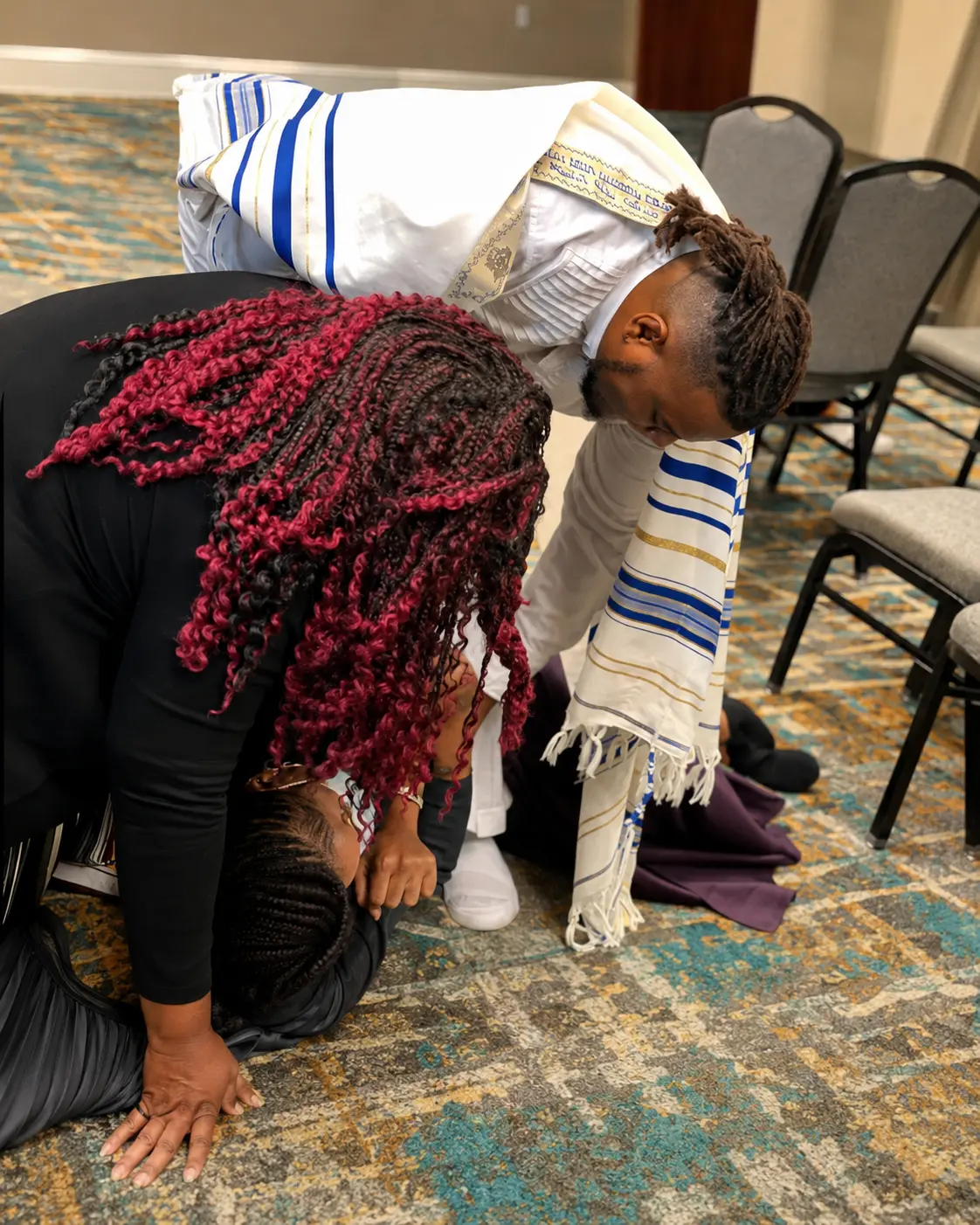 Prayer ministry during a community gathering