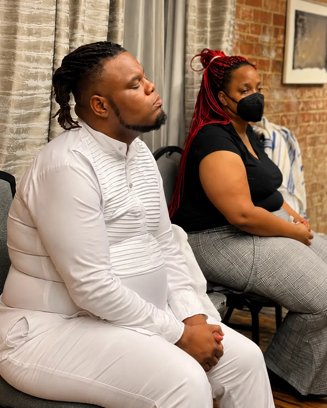 Praying with a community member